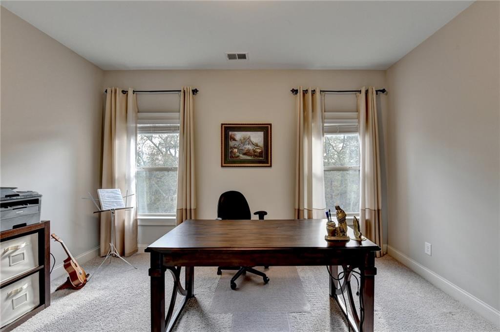 5930 Caveat Court Suwanee, GA 30024 - Photo 39 of 98 a view of a workspace with a window