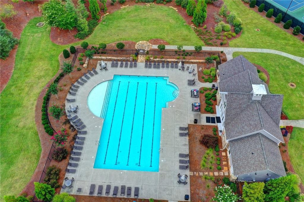 5930 Caveat Court Suwanee, GA 30024 - Photo 93 of 98 an aerial view of a house with a swimming pool outdoor seating and yard