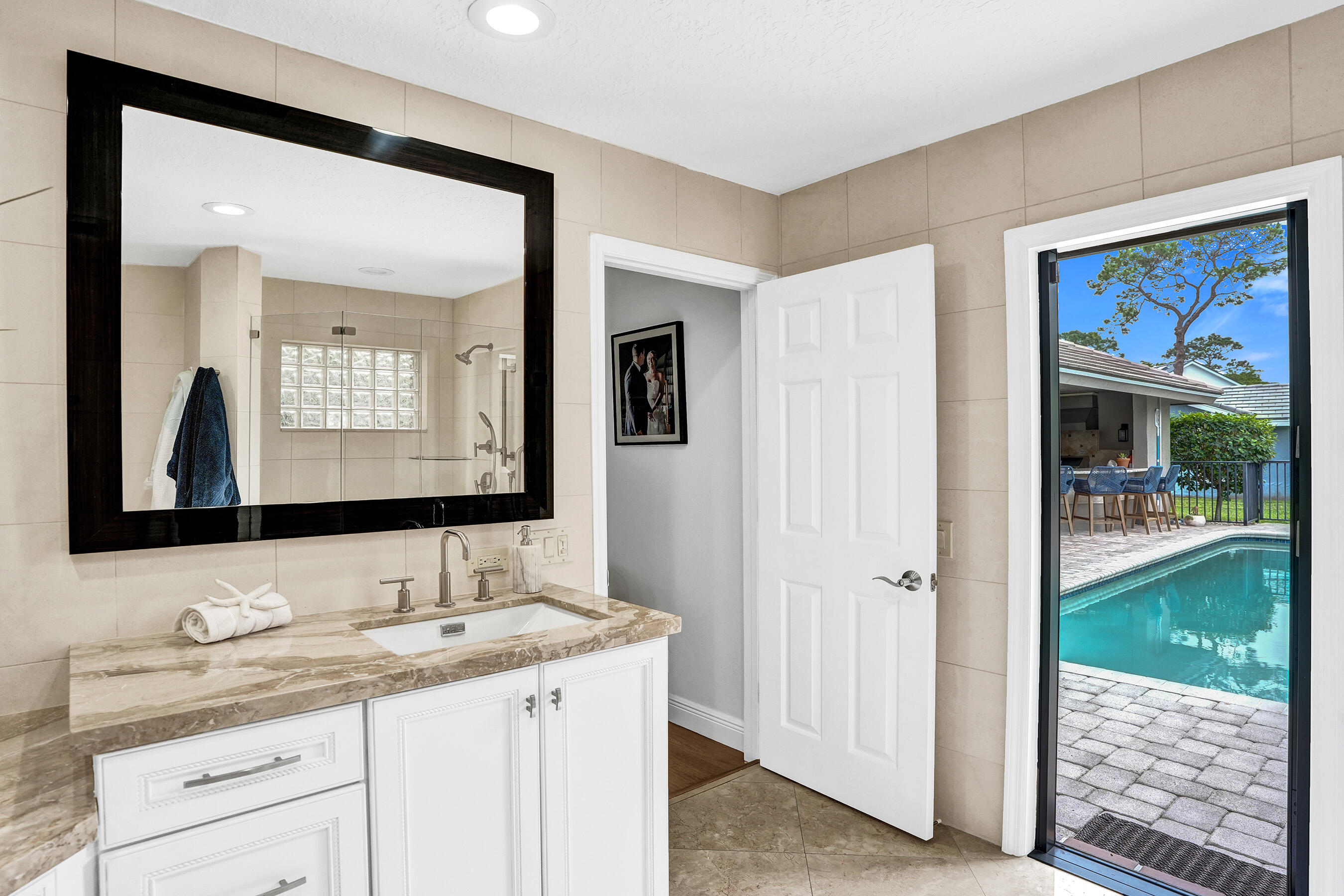 2413 Northwest 40th Circle Boca Raton, FL 33431 - Photo 30 of 66 Cabana Bath leading to Pool