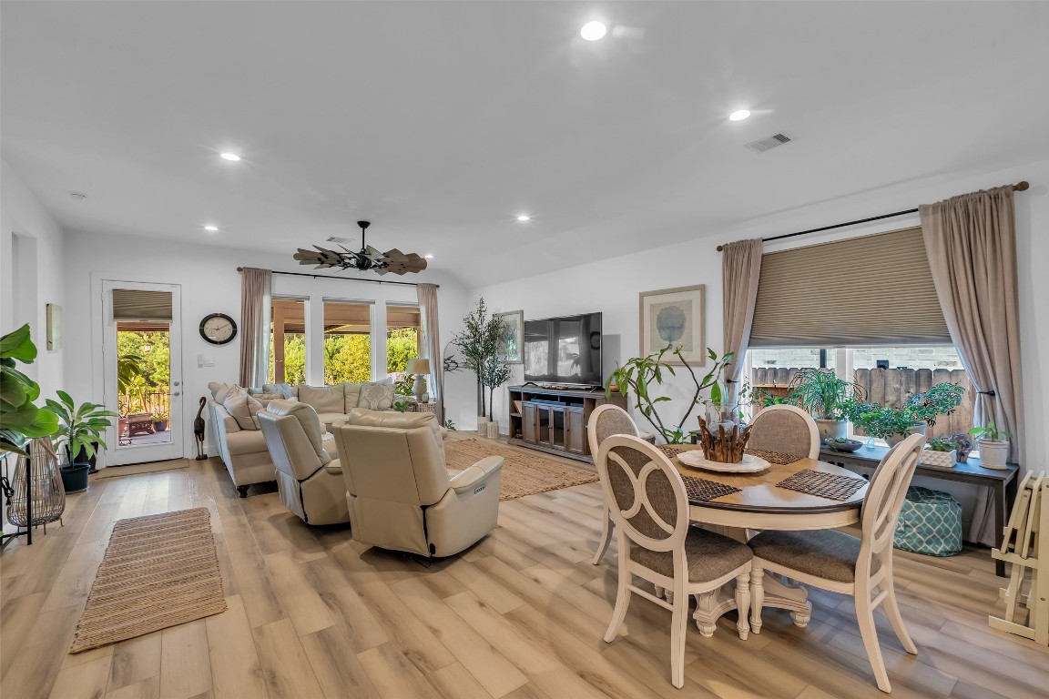 307 Springfield Terrace Drive Conroe, TX 77304 - Photo 13 of 30 a living room with furniture and a flat screen tv