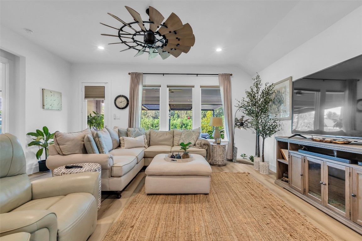 307 Springfield Terrace Drive Conroe, TX 77304 - Photo 15 of 30 a living room with furniture and a large window