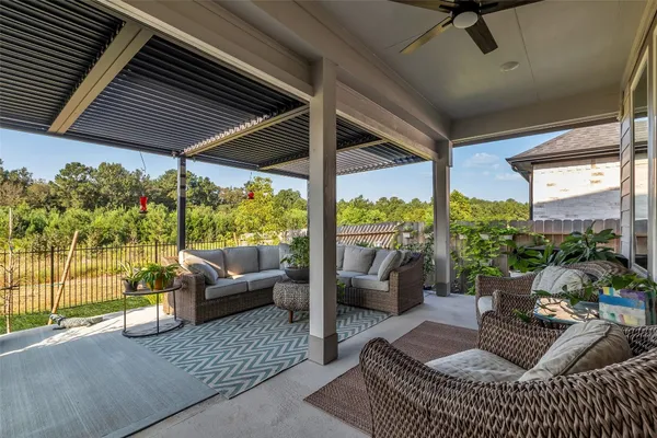 a outdoor living space with furniture and a potted plant