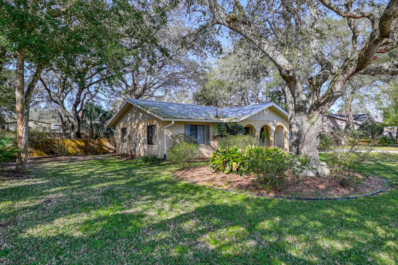 336 Lobelia Road St. Augustine, FL 32086 - Photo 2 of 46 a view of a house with a yard