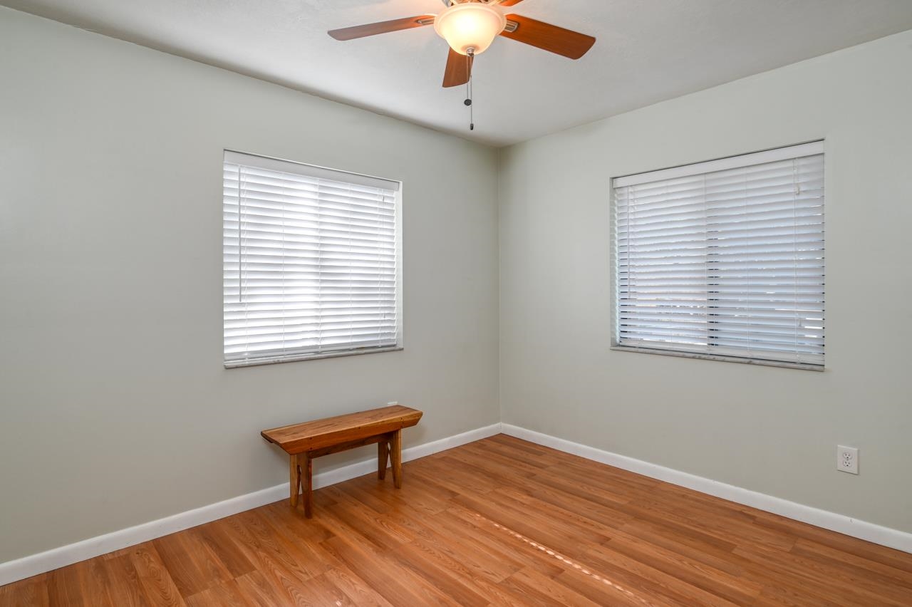336 Lobelia Road St. Augustine, FL 32086 - Photo 30 of 46 a bench sitting in a room next to a window