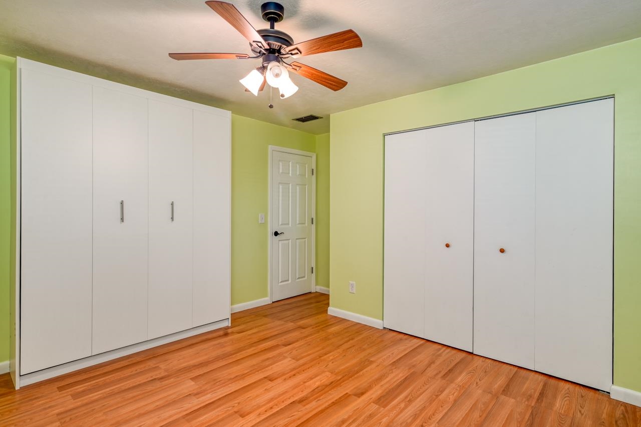 336 Lobelia Road St. Augustine, FL 32086 - Photo 34 of 46 a view of empty room with wooden floor