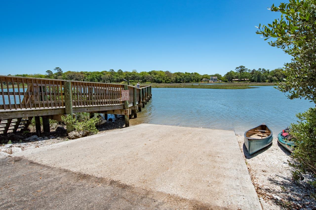 336 Lobelia Road St. Augustine, FL 32086 - Photo 44 of 46 a view of a lake with a terrace
