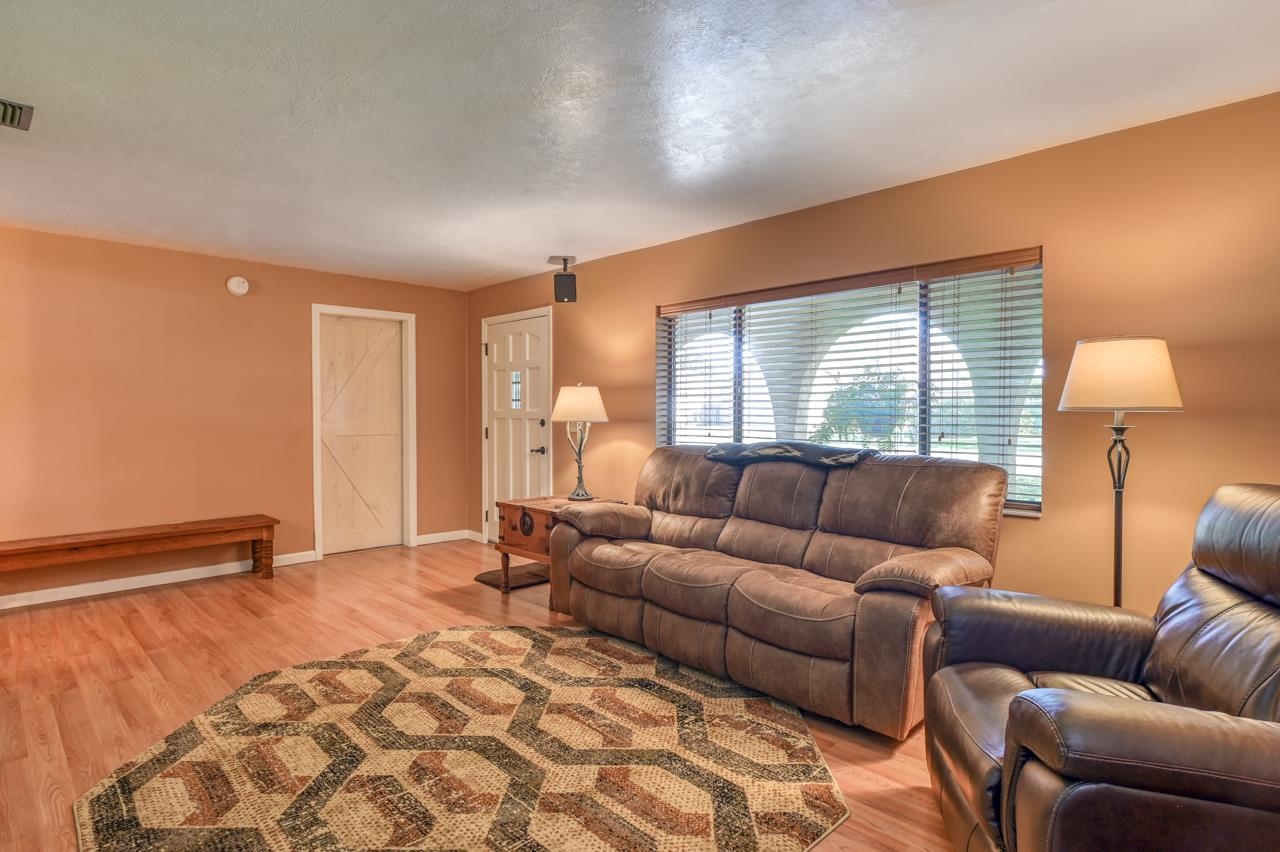 336 Lobelia Road St. Augustine, FL 32086 - Photo 8 of 46 a living room with furniture and a window