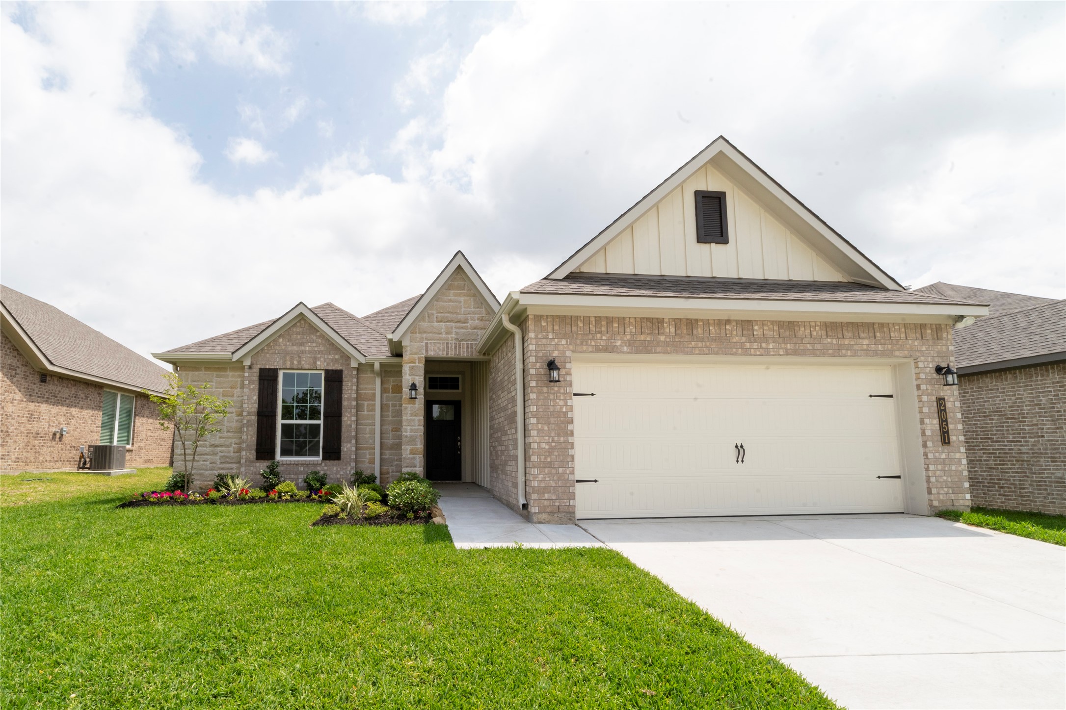 2051 Winepress Road Brenham, TX 77833 - Photo 2 of 31 a front view of house with yard