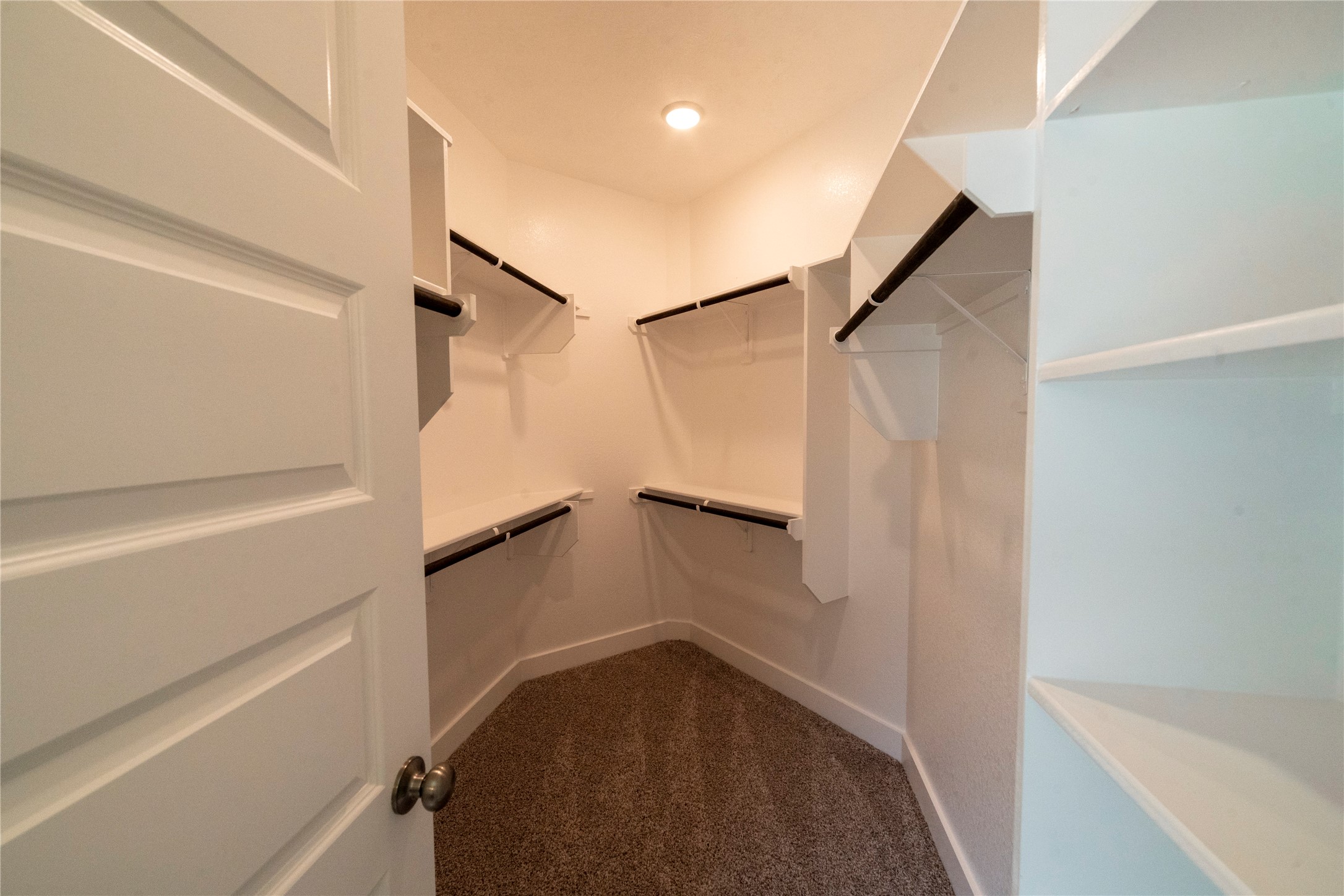 2051 Winepress Road Brenham, TX 77833 - Photo 29 of 31 a view of walk in closet
