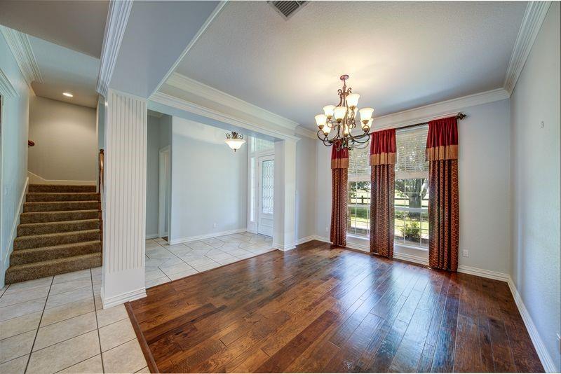 334 Farm To Market Road 2264 Decatur, TX 76234 - Photo 24 of 40 wooden floor in an empty room with a window