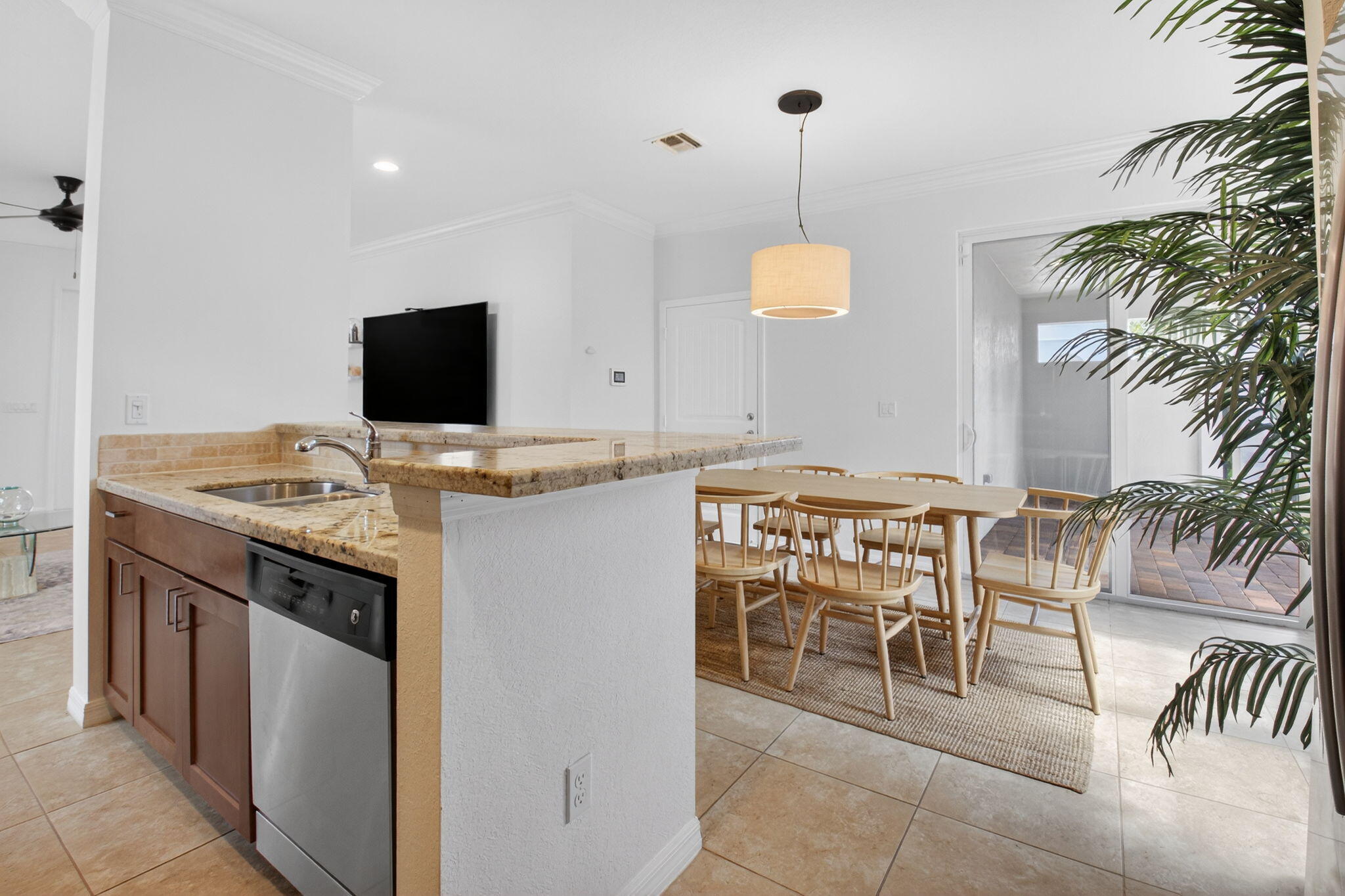 3630 Wolf Run Lane Boynton Beach, FL 33435 - Photo 14 of 59 a kitchen with a stove and a chair