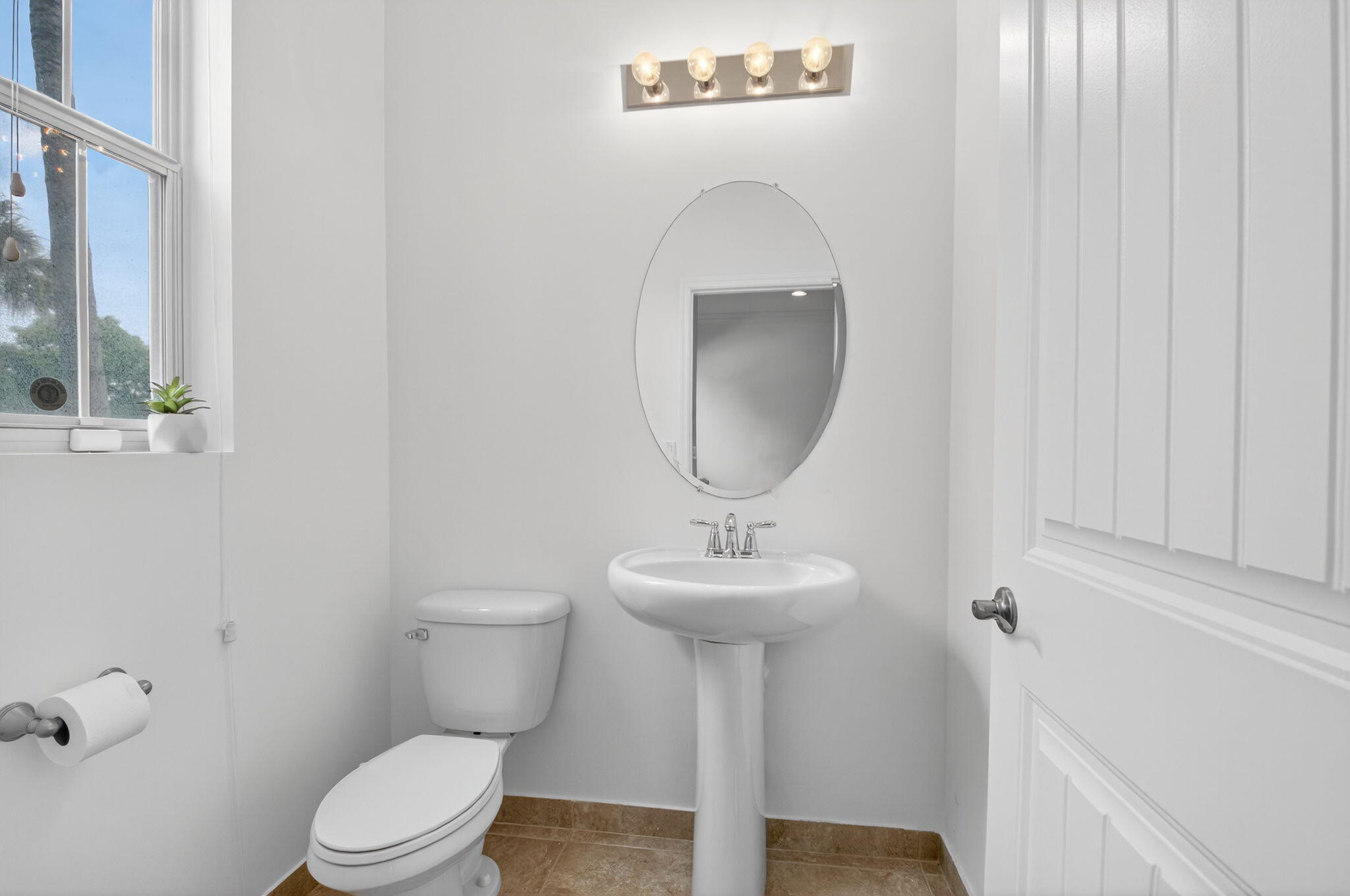 3630 Wolf Run Lane Boynton Beach, FL 33435 - Photo 18 of 59 a bathroom with a toilet sink and mirror