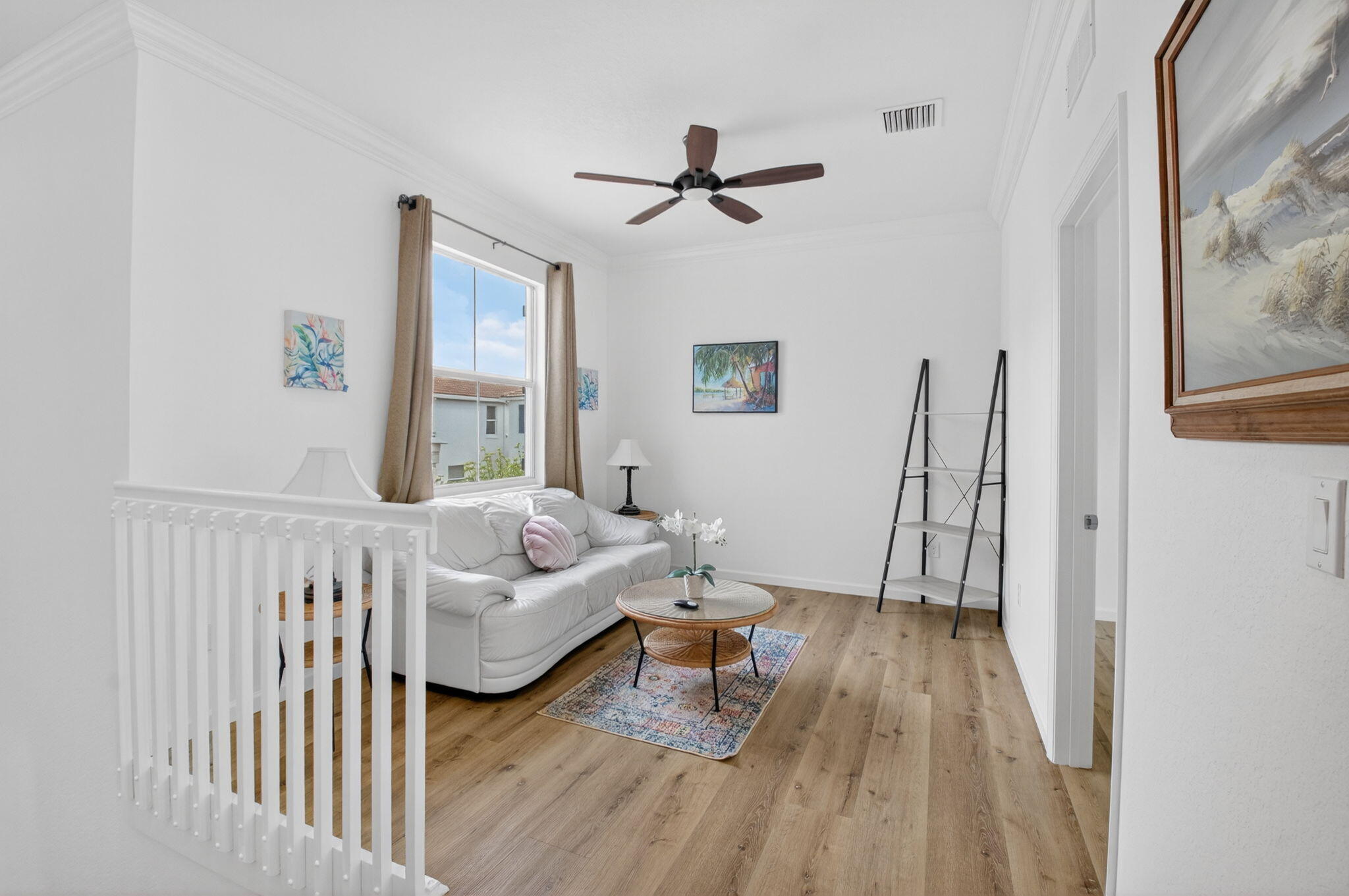 3630 Wolf Run Lane Boynton Beach, FL 33435 - Photo 19 of 59 a living room with furniture and a wooden floor