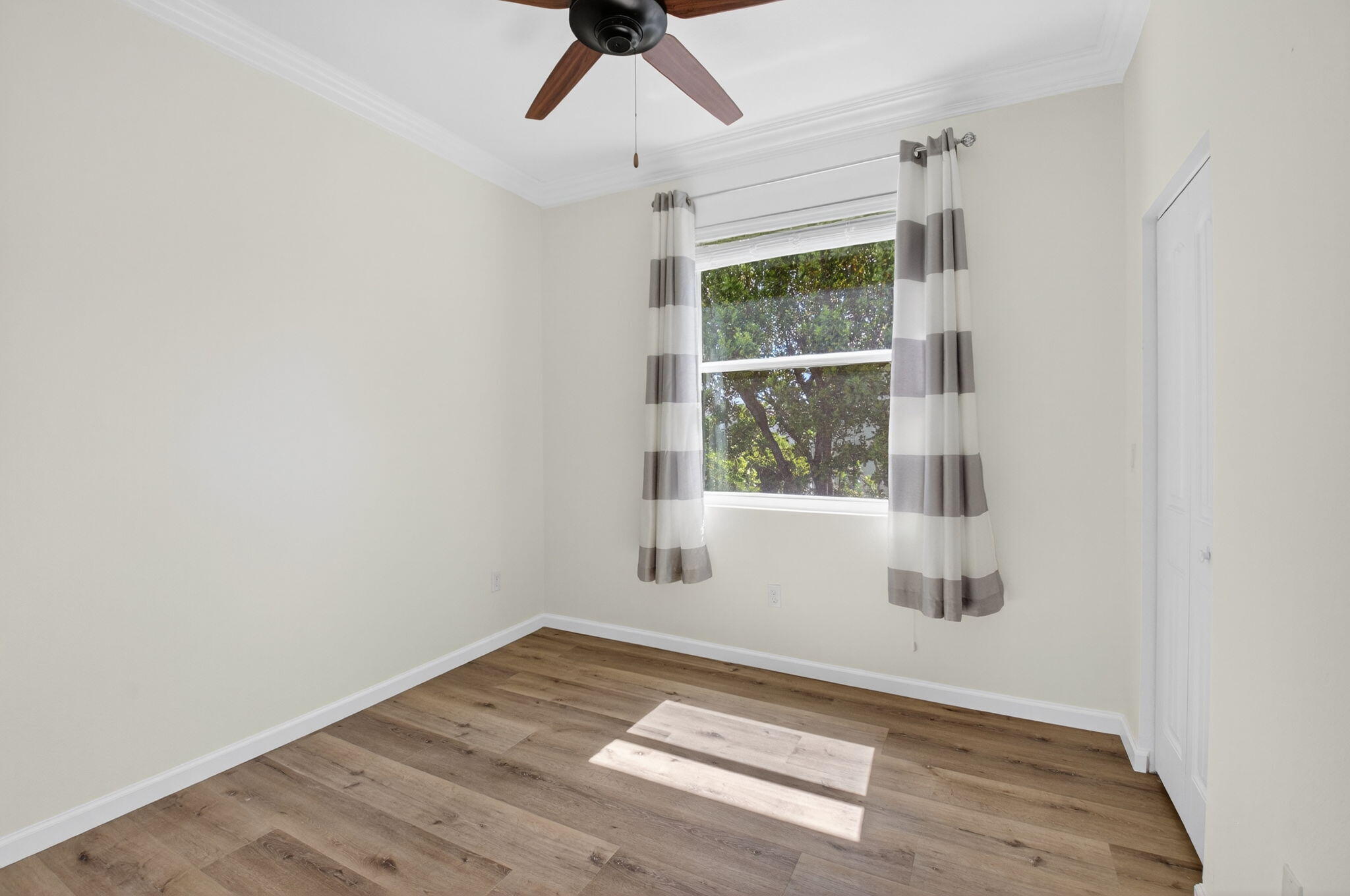 3630 Wolf Run Lane Boynton Beach, FL 33435 - Photo 21 of 59 a view of an empty room with a window