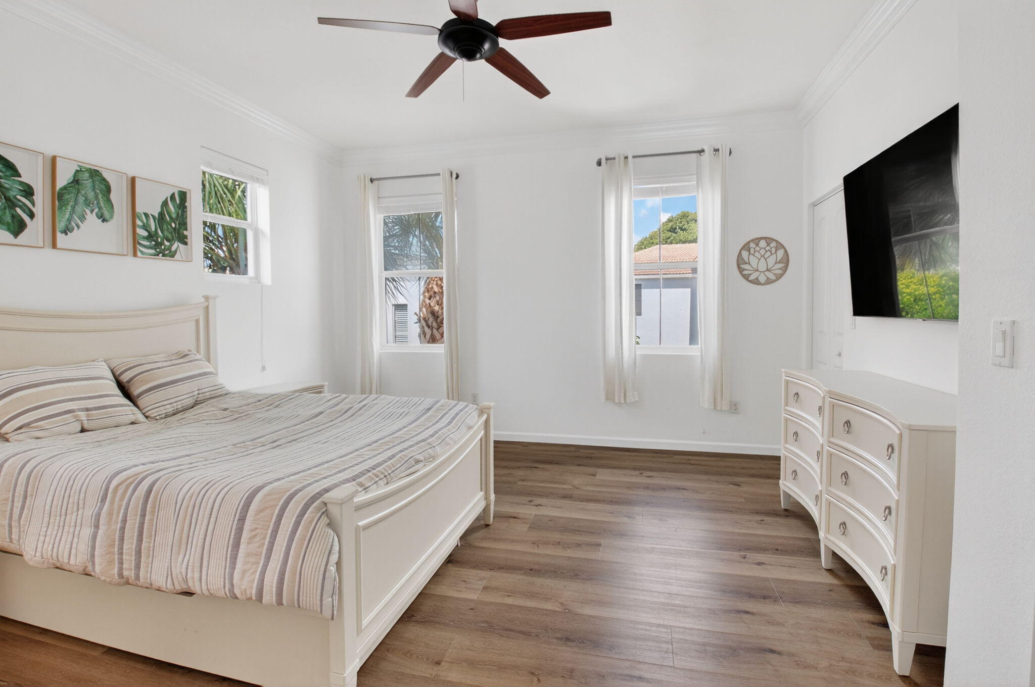 3630 Wolf Run Lane Boynton Beach, FL 33435 - Photo 27 of 59 a bedroom with a bed and a flat screen tv