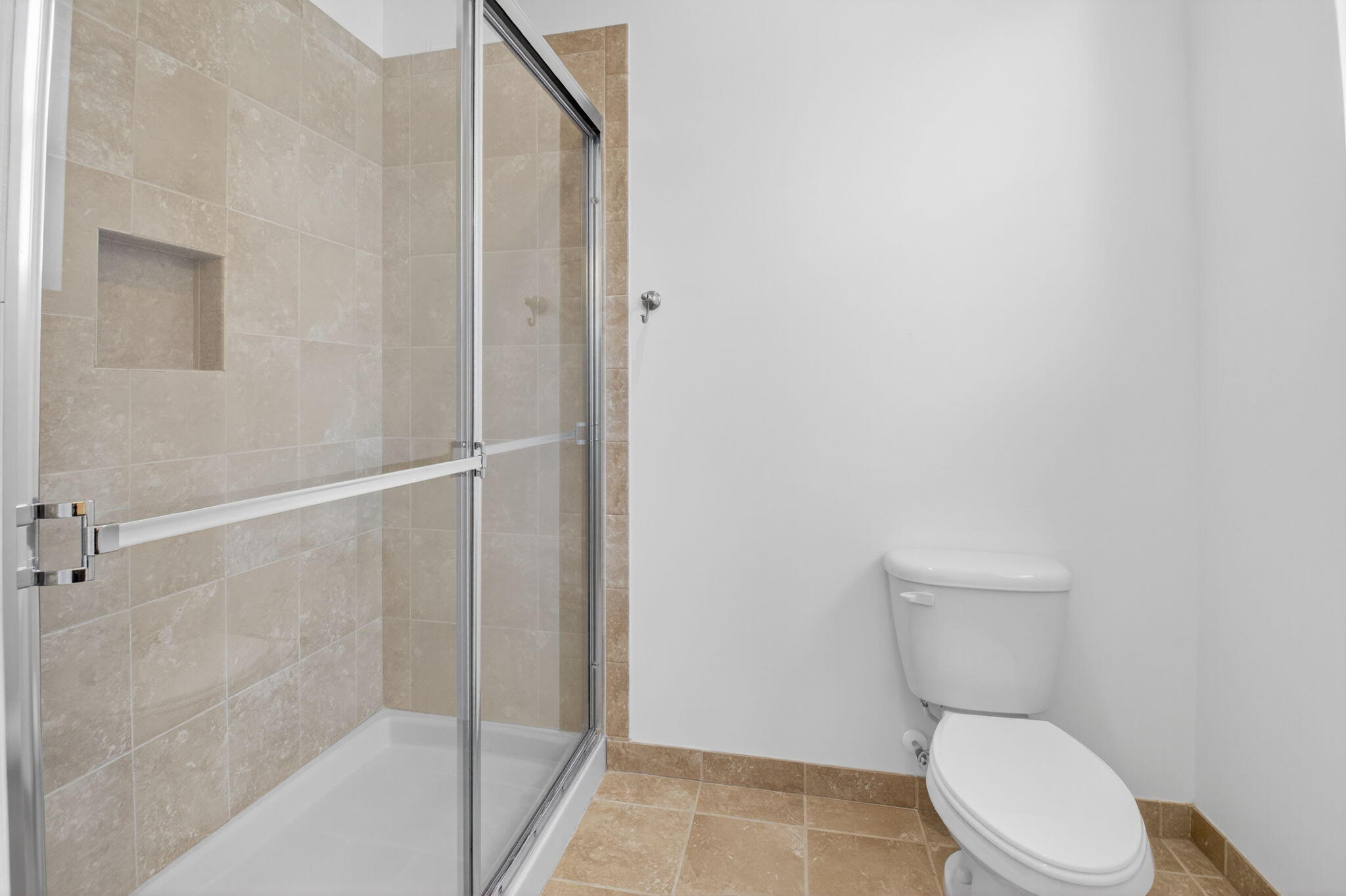 3630 Wolf Run Lane Boynton Beach, FL 33435 - Photo 32 of 59 a white toilet sitting next to a bath tub