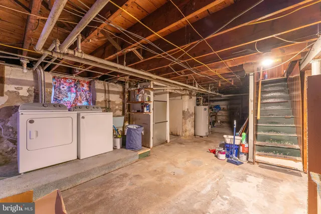 a view of a storage room with racks on the wall