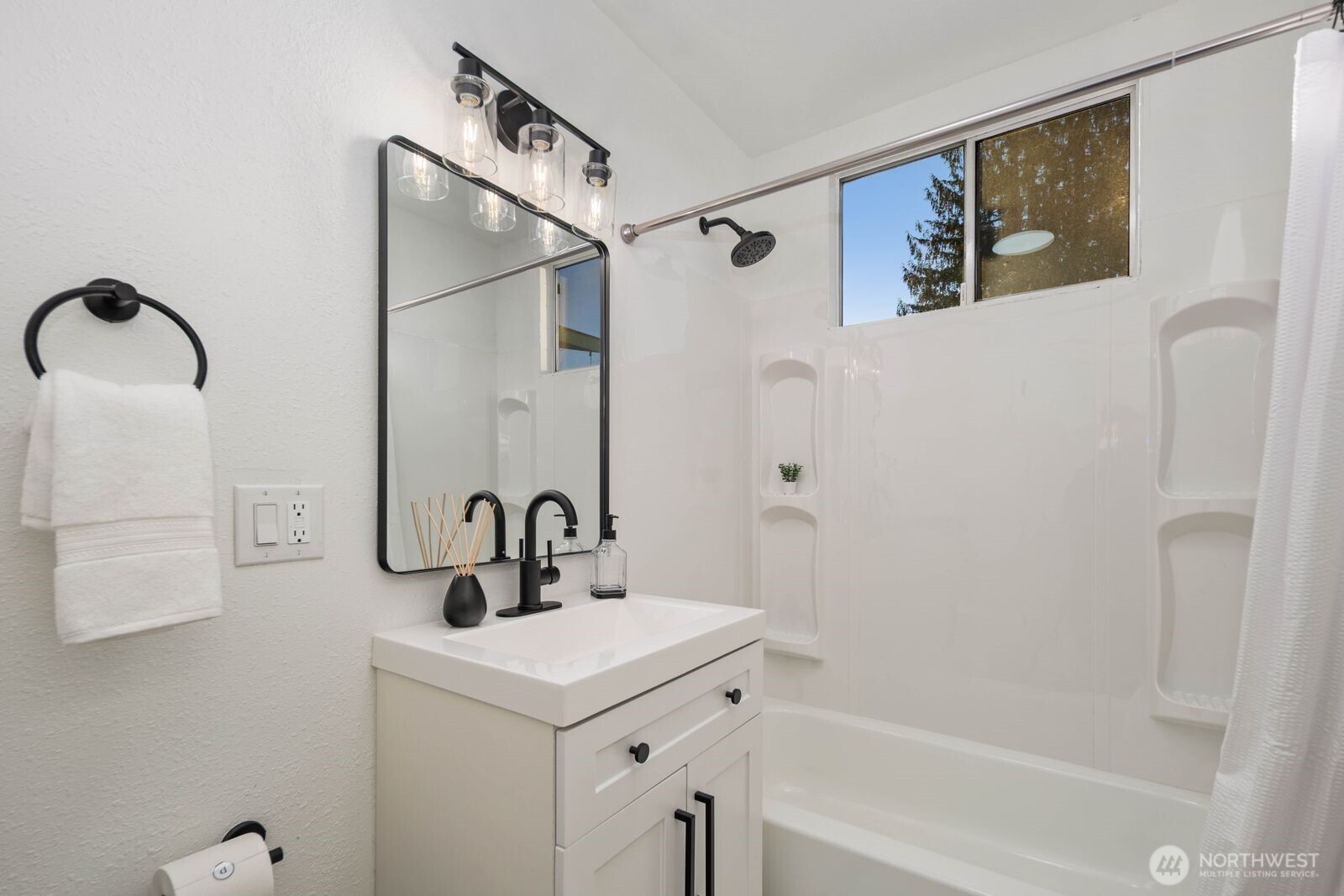 1011 Ironsides Avenue Bremerton, WA 98310 - Photo 13 of 31 a bathroom with a sink and mirror