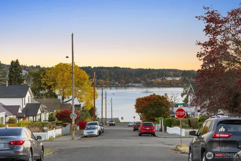a view of car parked on the roadside