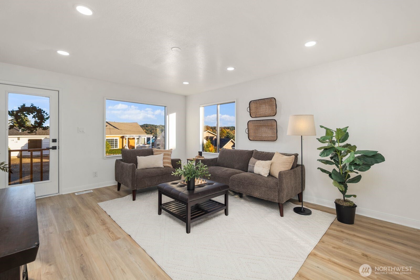 1011 Ironsides Avenue Bremerton, WA 98310 - Photo 5 of 31 a living room with furniture and a potted plant