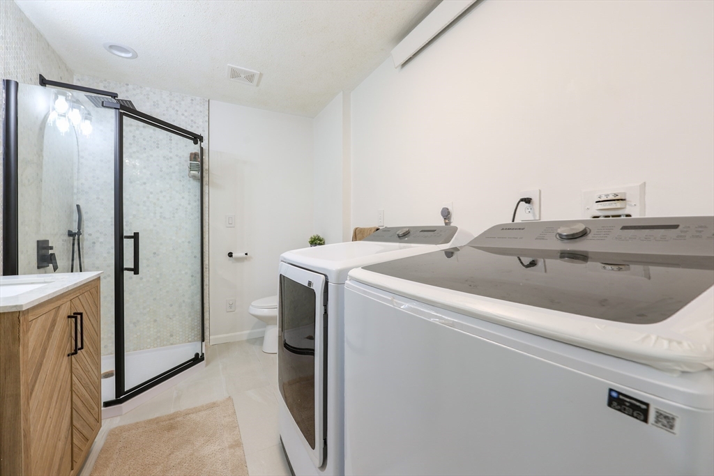 6 Matthew Lane Chelmsford, MA 01824 - Photo 16 of 37 a utility room with dryer and washer