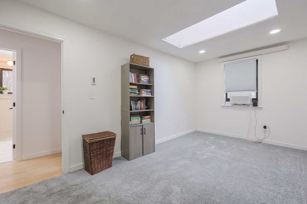 6 Matthew Lane Chelmsford, MA 01824 - Photo 23 of 37 a view of an empty room with a empty space