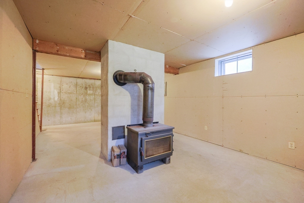 6 Matthew Lane Chelmsford, MA 01824 - Photo 33 of 37 a room with a door