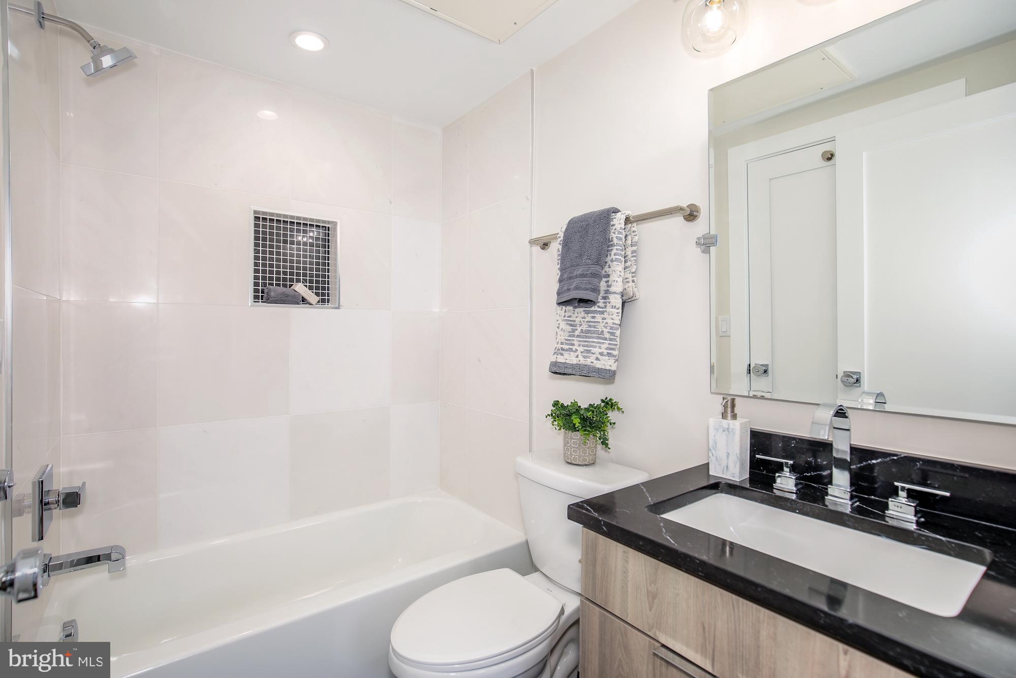 1421 Spring Road Northwest, Unit 302 Washington, DC 20010 - Photo 8 of 18 Bathroom 1 w/ soaking tub