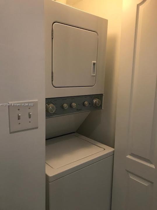 1453 Southwest 3rd Street, Unit 205 Miami, FL 33135 - Photo 5 of 9 a utility room with dryer and washer