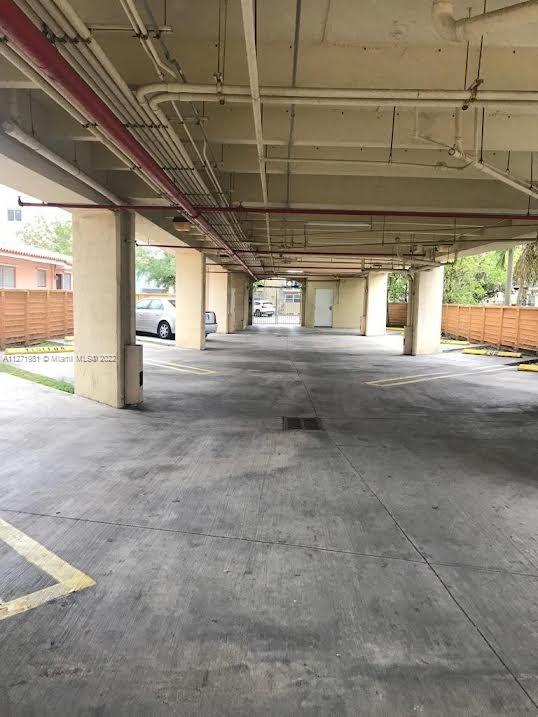 1453 Southwest 3rd Street, Unit 205 Miami, FL 33135 - Photo 9 of 9 a view of a room with wooden walls