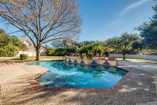 a view of a backyard with green space