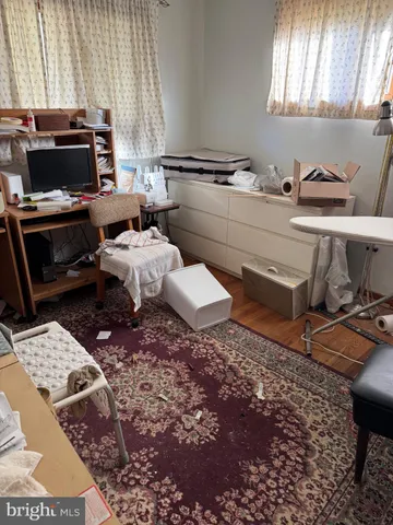 a room with a couch and a stove