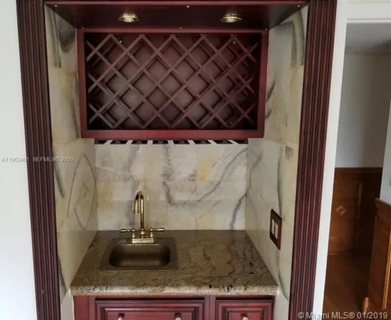 a close view of sink and mirror