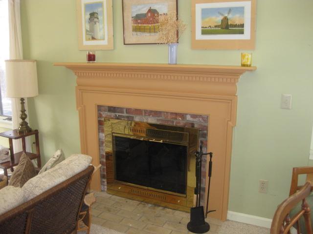 380 Governor Prence Road Eastham, MA 02642 - Photo 14 of 28 a living room with furniture and a fireplace