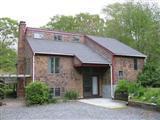 380 Governor Prence Road Eastham, MA 02642 - Photo 3 of 28 a front view of a house with garden