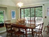 380 Governor Prence Road Eastham, MA 02642 - Photo 6 of 28 a view of a dining room with furniture and window