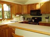 380 Governor Prence Road Eastham, MA 02642 - Photo 7 of 28 a view of kitchen and microwave
