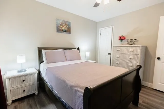 a bedroom with a bed and a closet