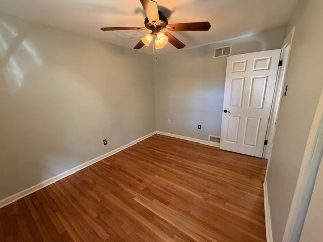 1219 South White Station Road Memphis, TN 38117 - Photo 14 of 18 wooden floor in an empty room
