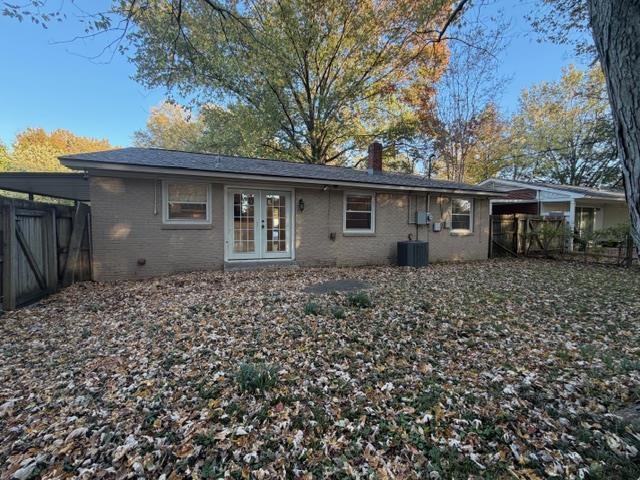 1219 South White Station Road Memphis, TN 38117 - Photo 17 of 18 a backyard of a house with large trees