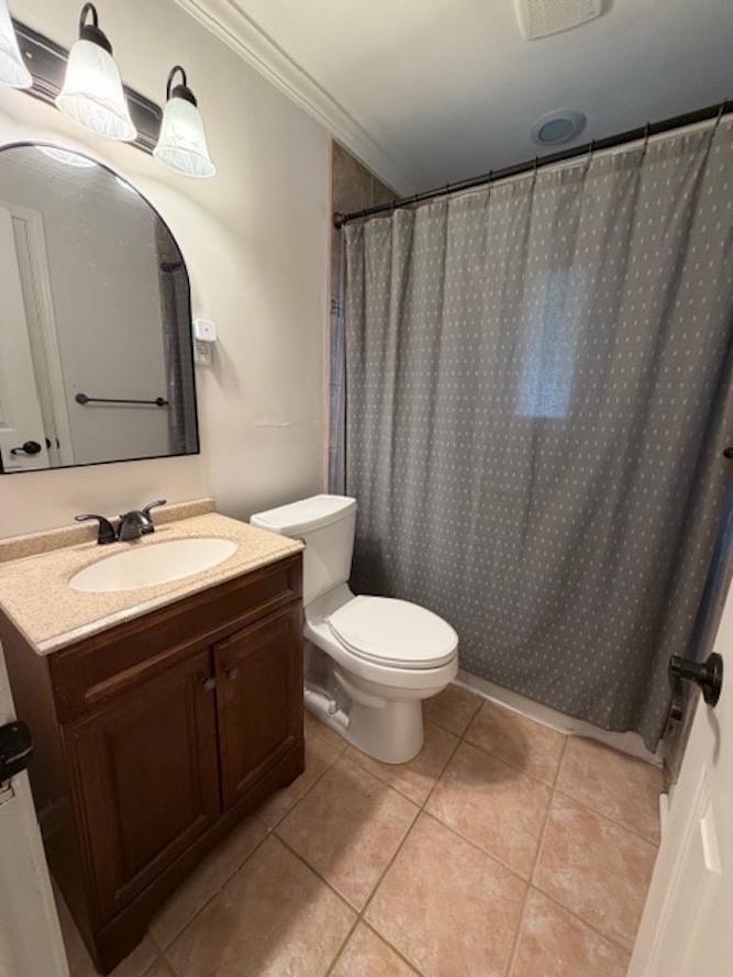 1219 South White Station Road Memphis, TN 38117 - Photo 10 of 18 a bathroom with a toilet sink and mirror