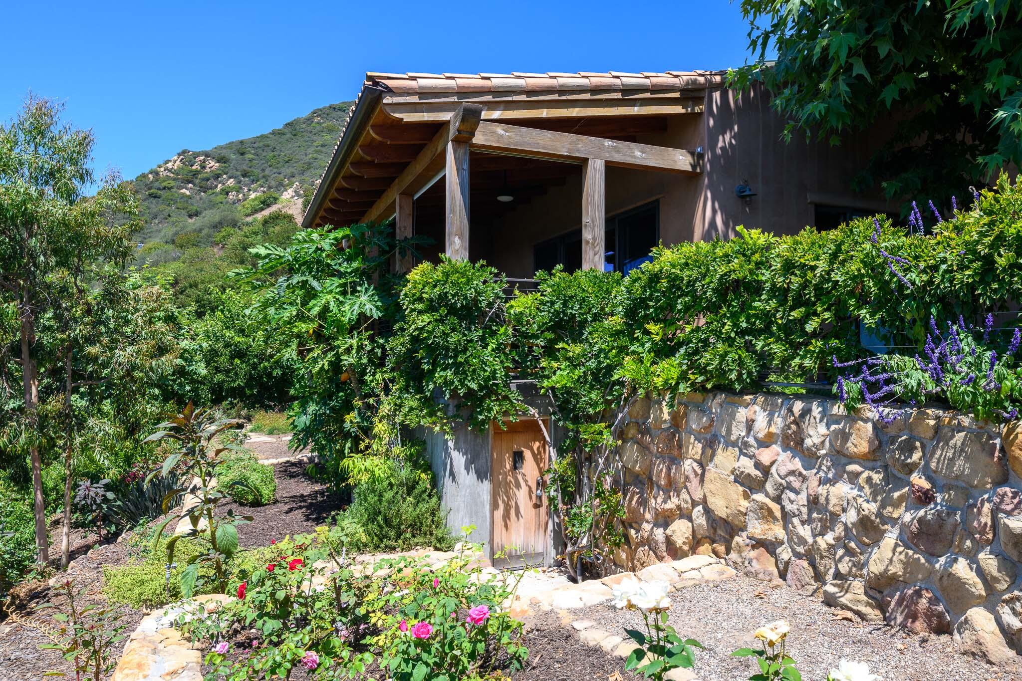 356 East Mountain Drive Montecito, CA 93108 - Photo 24 of 36 a view of a wooden house with a large windows