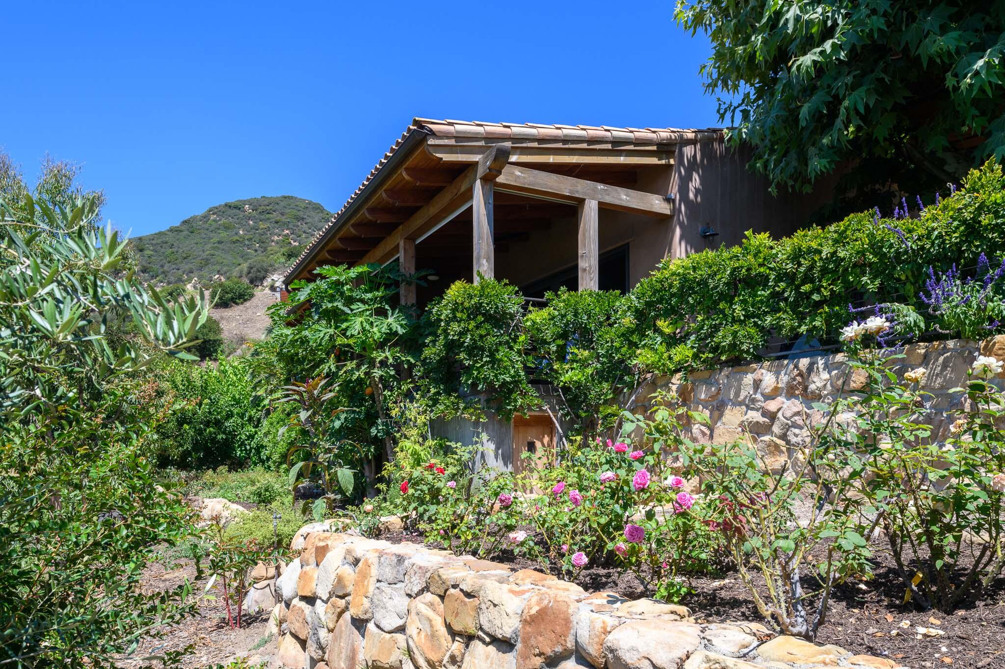 356 East Mountain Drive Montecito, CA 93108 - Photo 26 of 36 a view of a house with a yard