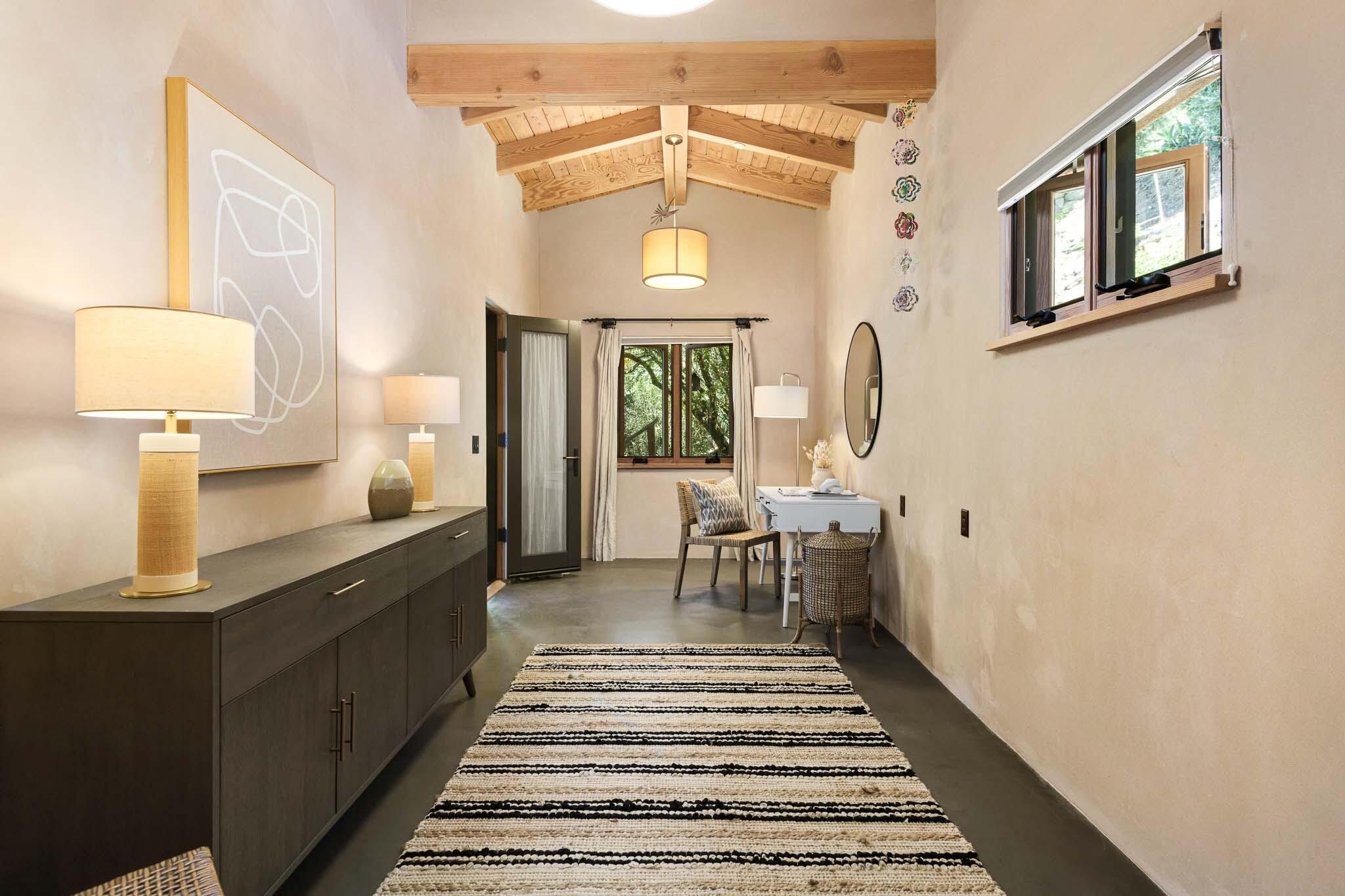 356 East Mountain Drive Montecito, CA 93108 - Photo 29 of 36 a view of a hallway to a livingroom with furniture