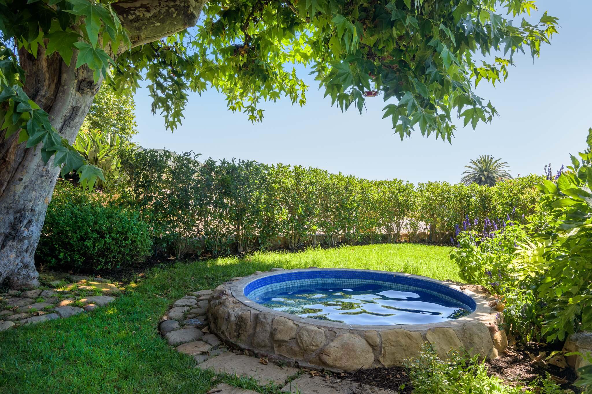 356 East Mountain Drive Montecito, CA 93108 - Photo 33 of 36 a view of a swimming pool with a yard