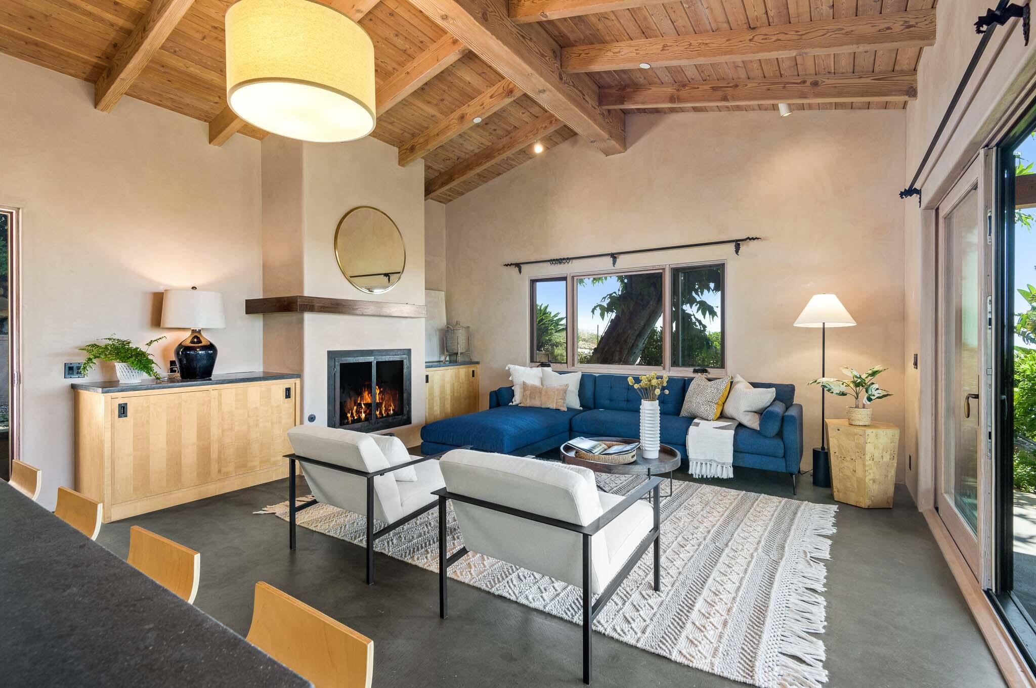 356 East Mountain Drive Montecito, CA 93108 - Photo 5 of 36 a living room with furniture and a fireplace