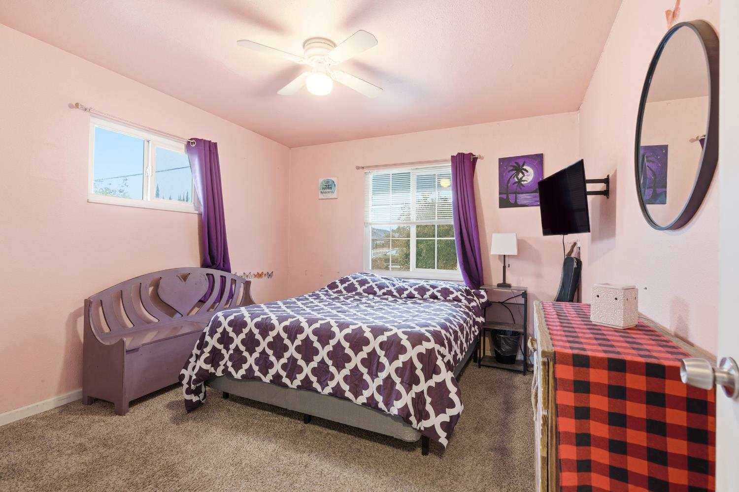 405 East Edison Street Manteca, CA 95336 - Photo 18 of 38 a bedroom with a bed a couch and dresser