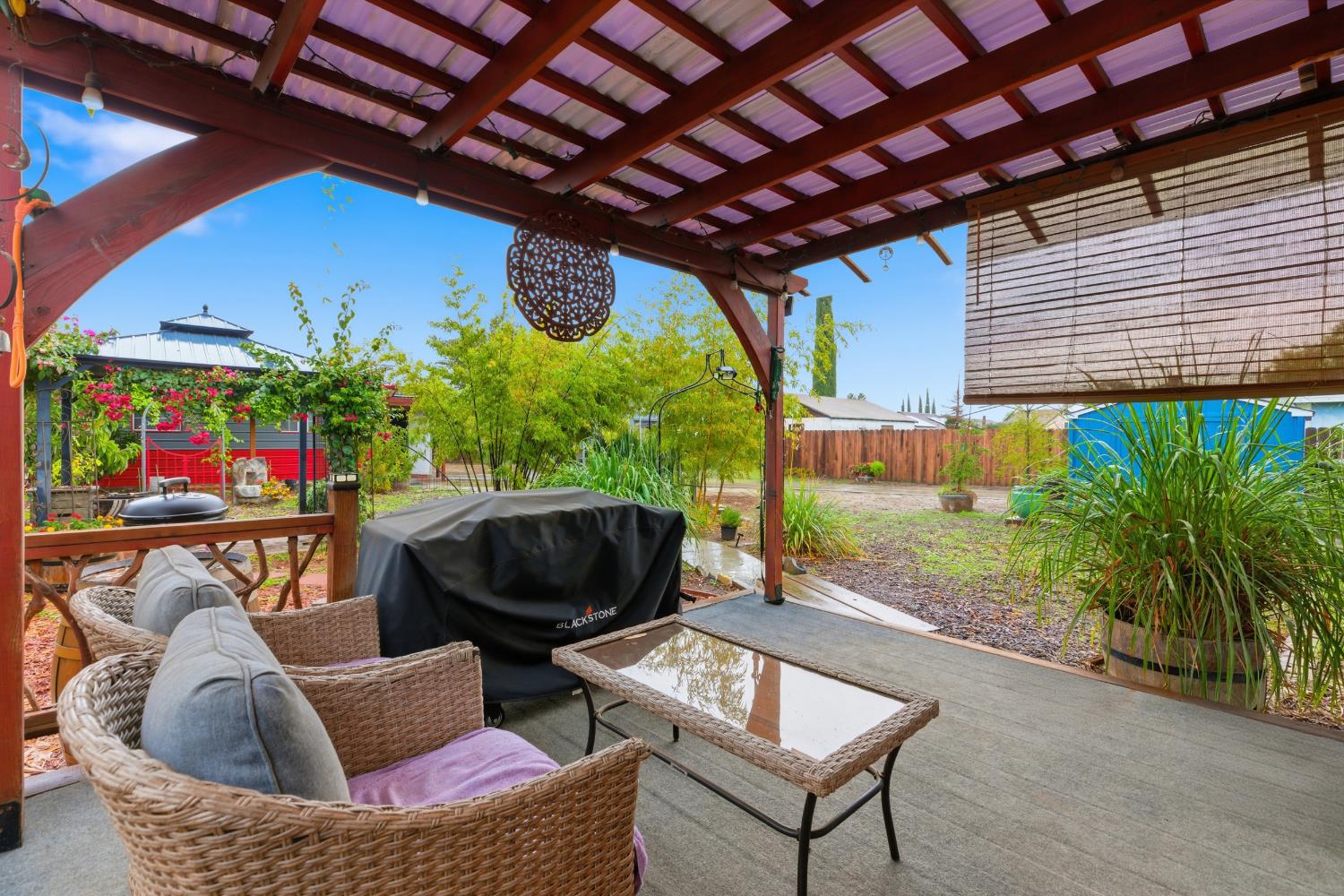 405 East Edison Street Manteca, CA 95336 - Photo 24 of 38 a outdoor living space with furniture and garden view