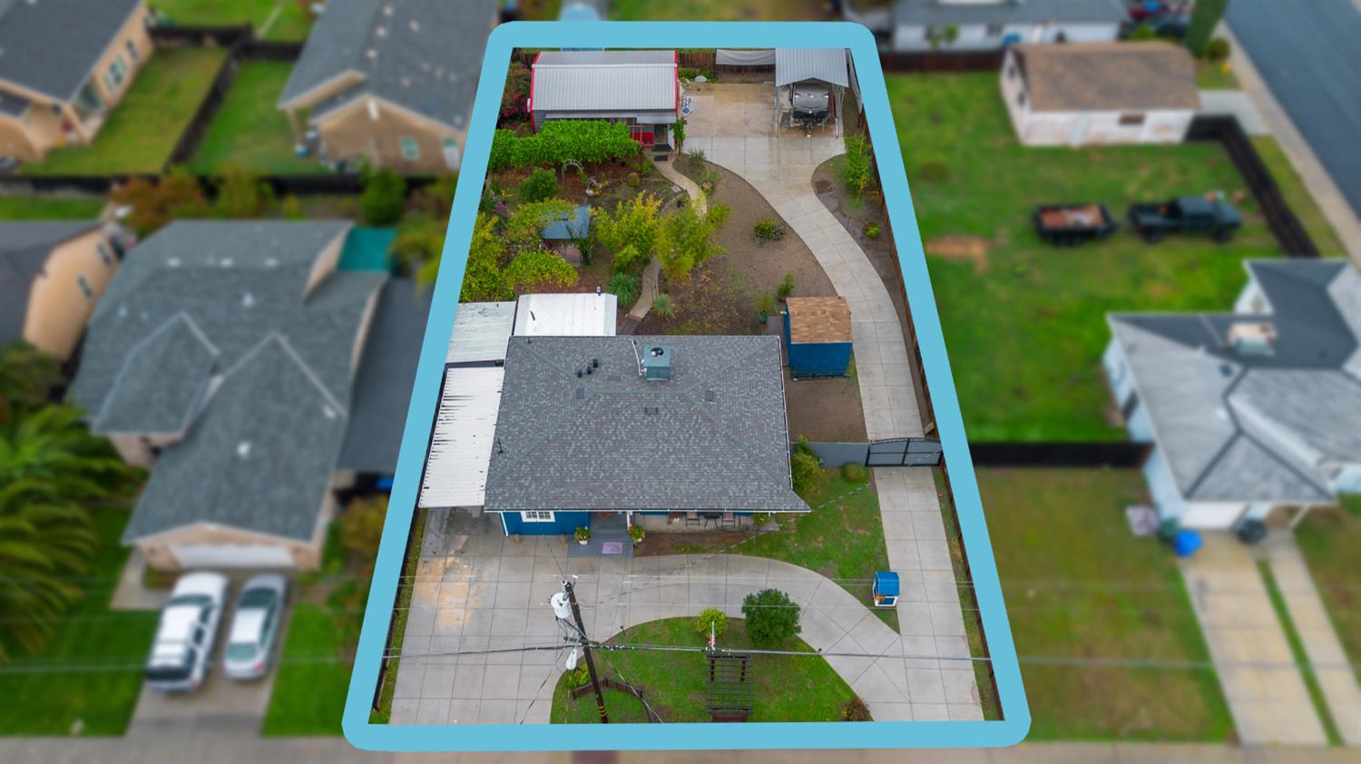405 East Edison Street Manteca, CA 95336 - Photo 33 of 38 an aerial view of a house with a garden and trees