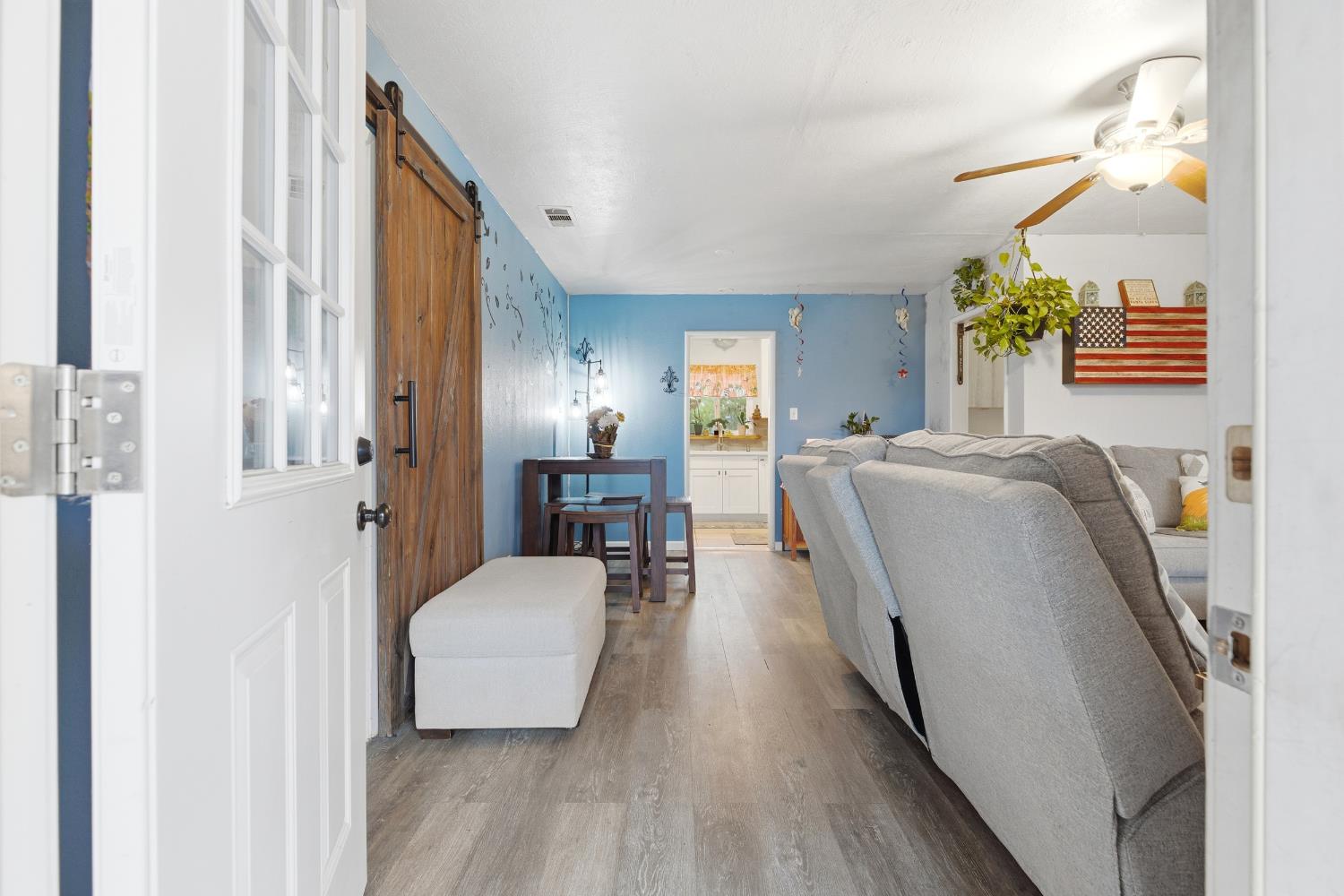 405 East Edison Street Manteca, CA 95336 - Photo 5 of 38 a living room with furniture and a wooden floor